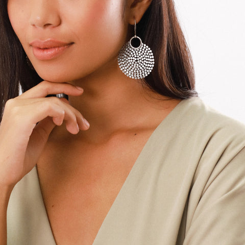 Silver Starburst Statement Earrings On