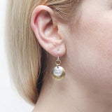 Marjorie Baer Ring With Layered Silver Gold Disc Earrings On Ear